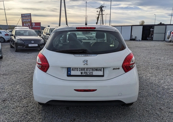 Peugeot 208 cena 24800 przebieg: 169000, rok produkcji 2013 z Dynów małe 79